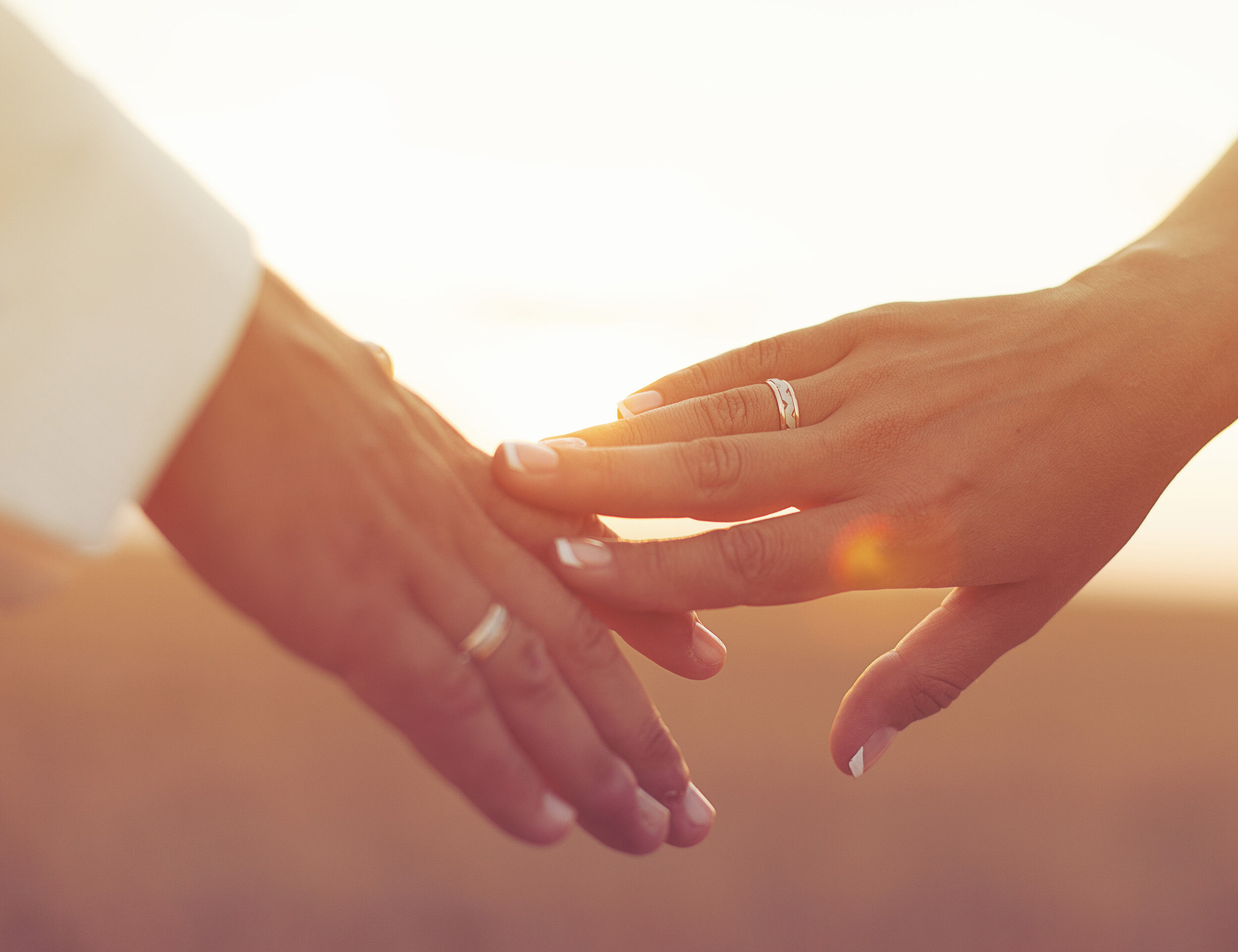 A bride and groom flaunting their beautifull rings on their engagement ceremony